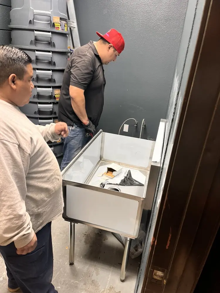 Commercial plumbing and sink installation in Elmer
